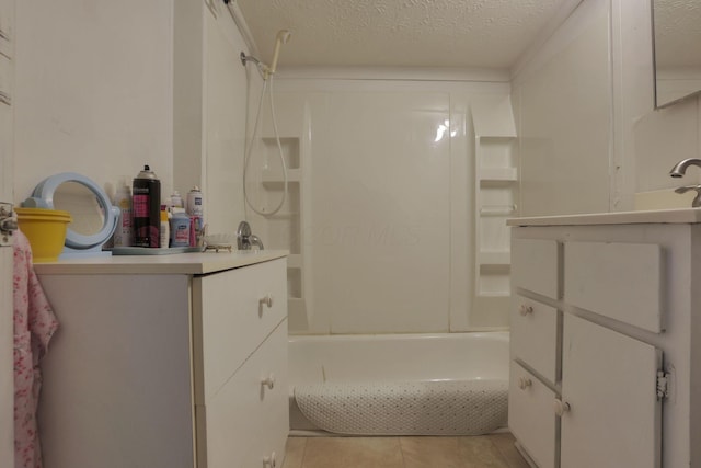 936 Washington Ave, Lancaster, OH 43130 - bathroom featuring shower / tub combination, vanity, a textured ceiling, and tile patterned flooring