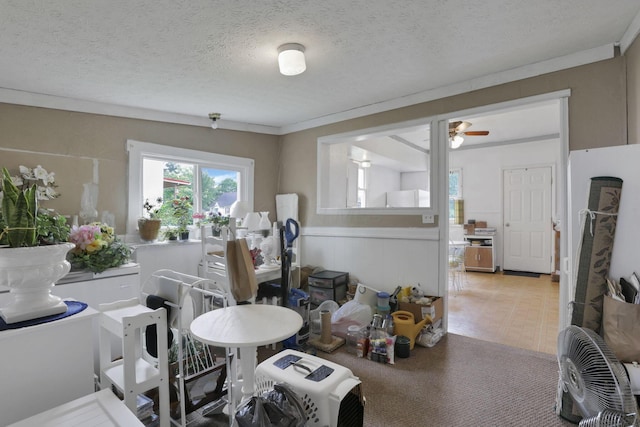 936 Washington Ave, Lancaster, OH 43130 - dining area with tile patterned floors, a textured ceiling, and a ceiling fan