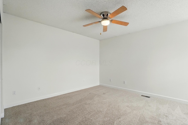 2511 Gardenia Dr Unit 76A, Columbus, OH 43235 - carpeted spare room featuring a ceiling fan, baseboards, and a textured ceiling