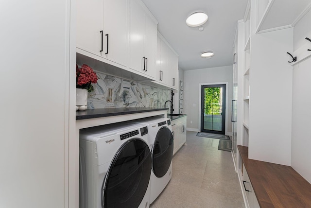8159 Riverside Dr, Powell, OH 43065 - washroom featuring washer and dryer and cabinet space