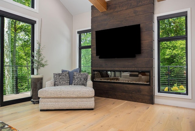 8159 Riverside Dr, Powell, OH 43065 - sitting room featuring vaulted ceiling and wood finished floors