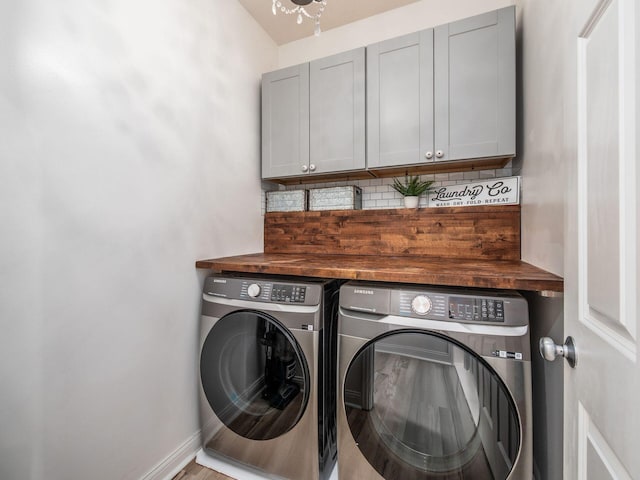 593 Summer Tree Loop, Marysville, OH 43040 - laundry room with separate washer and dryer, cabinet space, and baseboards