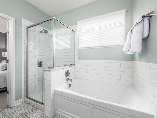 593 Summer Tree Loop, Marysville, OH 43040 - full bathroom featuring connected bathroom, a garden tub, a stall shower, and tile patterned flooring