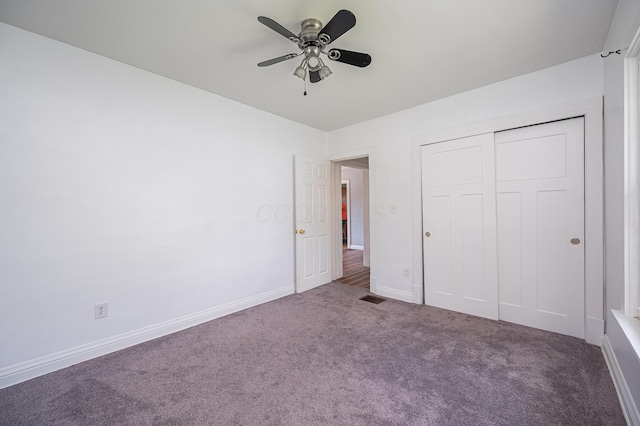 4469 Lancaster Ave, Columbus, OH 43207 - unfurnished bedroom with carpet flooring, a closet, and a ceiling fan