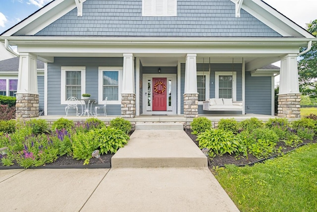 10641 Arrowwood Dr, Plain City, OH 43064 - craftsman-style home featuring covered porch and stone siding