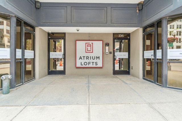 106 N High St Unit 303, Columbus, OH 43215 - entrance to property with stucco siding and a security system