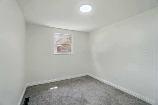 1410 E Dublin Granville Rd, Columbus, OH 43229 - carpeted spare room with baseboards