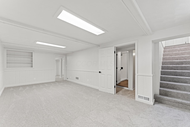 1116 S Yearling Rd, Columbus, OH 43227 - finished below grade area with carpet, stairway, and a decorative wall