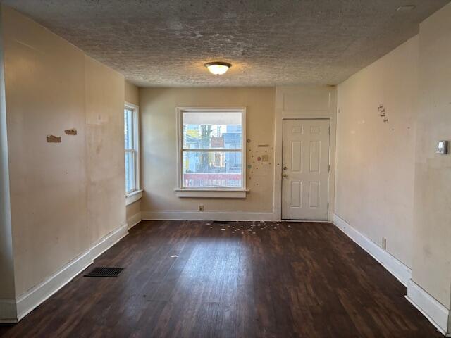 411 Berkeley Rd, Columbus, OH 43205 - entrance foyer featuring wood finished floors, a textured ceiling, and baseboards
