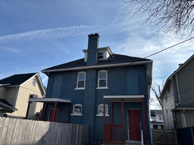 411 Berkeley Rd, Columbus, OH 43205 - rear view of property featuring a chimney and brick siding
