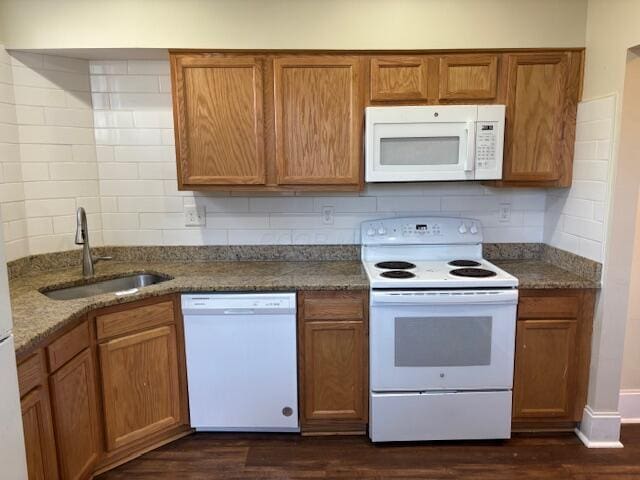 411 Berkeley Rd, Columbus, OH 43205 - kitchen featuring white appliances, a sink, backsplash, and dark wood-style flooring