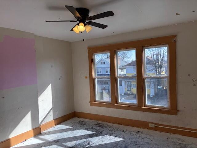 411 Berkeley Rd, Columbus, OH 43205 - unfurnished room with healthy amount of natural light, baseboards, and a ceiling fan