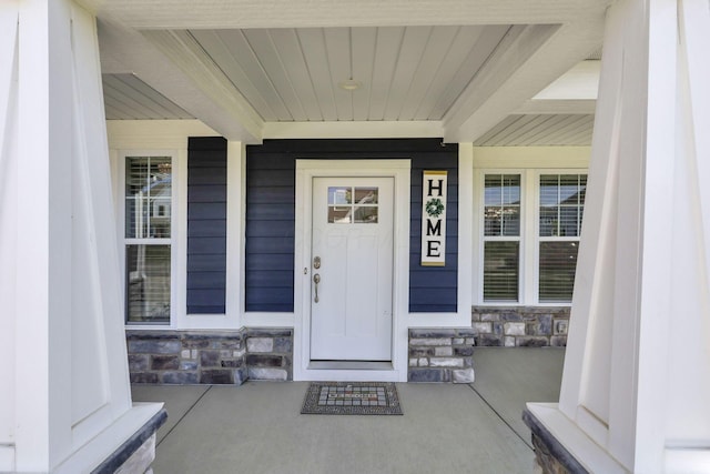 7578 Hastings St, Pickerington, OH 43147 - view of exterior entry with stone siding and a porch