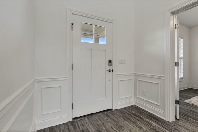 7578 Hastings St, Pickerington, OH 43147 - entrance foyer with a decorative wall, dark wood-type flooring, and wainscoting
