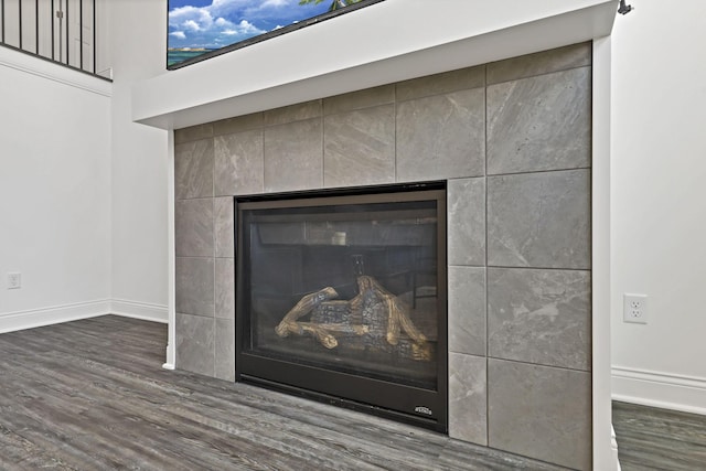 7578 Hastings St, Pickerington, OH 43147 - detailed view of wood finished floors, a fireplace, and baseboards