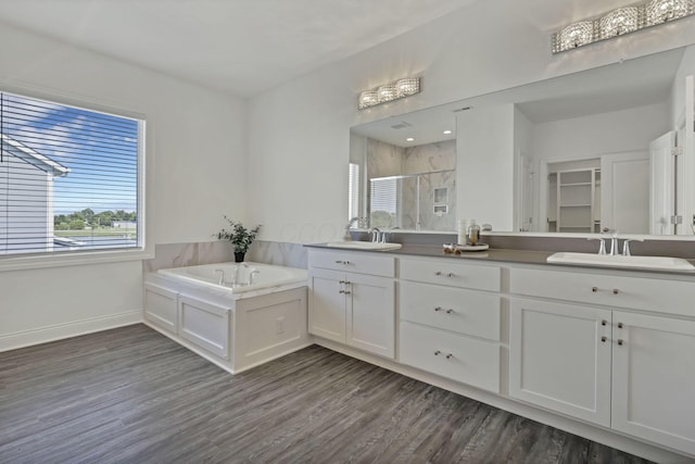 7578 Hastings St, Pickerington, OH 43147 - full bathroom with a shower stall, wood finished floors, and double vanity