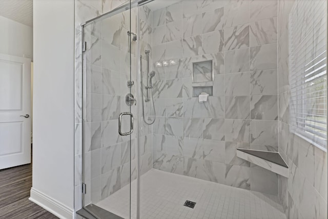 7578 Hastings St, Pickerington, OH 43147 - full bath with a shower stall, wood finished floors, and baseboards