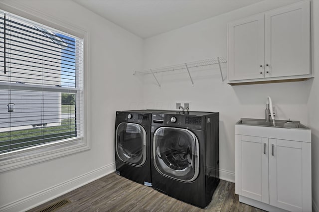 7578 Hastings St, Pickerington, OH 43147 - laundry room featuring washer and clothes dryer, dark wood finished floors, baseboards, and cabinet space