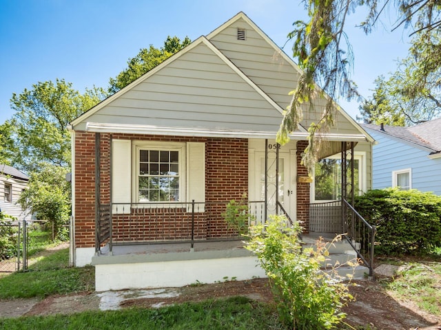 1052 Geers Ave, Columbus, OH 43206 - bungalow with covered porch and brick siding