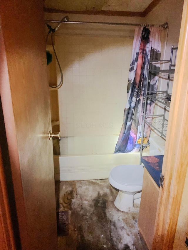 12047 Beech Trl, Hillsboro, OH 45133 - full bath featuring shower / bath combo, toilet, and unfinished concrete flooring