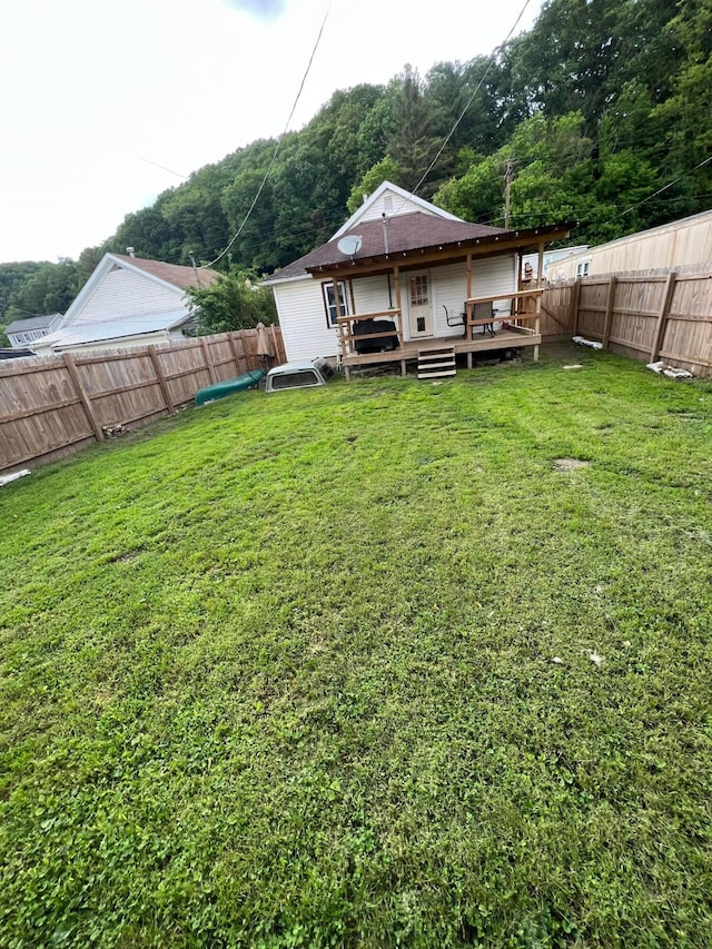 1119 Poplar St, Nelsonville, OH 45764 - back of property with a deck