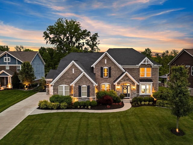 3624 Sparrow Ct, Hilliard, OH 43026 - craftsman inspired home featuring stone siding, a front yard, and concrete driveway