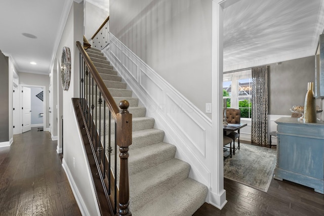 3624 Sparrow Ct, Hilliard, OH 43026 - stairway featuring crown molding, wood-type flooring, and recessed lighting