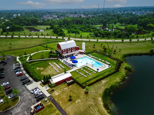 10319 Fox Hill Ct, Plain City, OH 43064 - aerial view of a nearby body of water, a pool area, and a tree filled landscape
