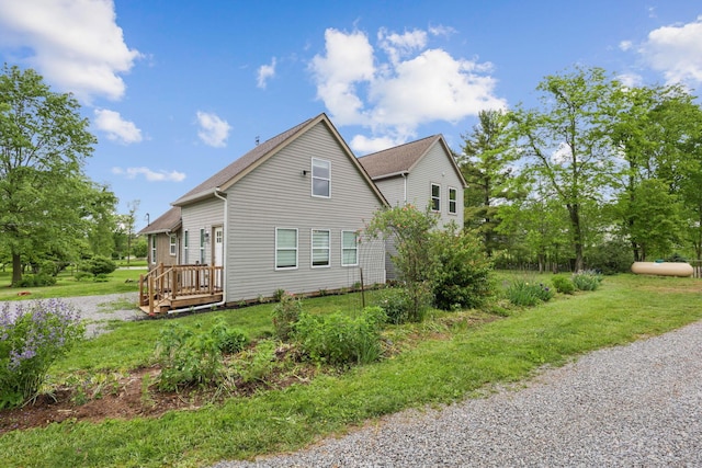 7700 State Route 61, Sunbury, OH 43074 - view of home's exterior featuring a yard and a deck