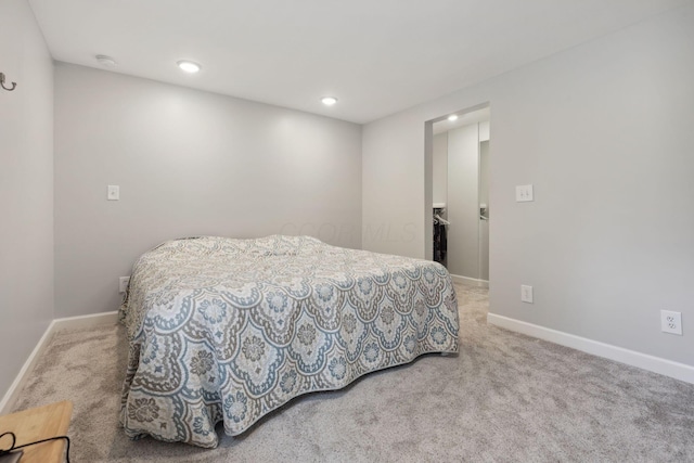 7700 State Route 61, Sunbury, OH 43074 - bedroom featuring carpet flooring, baseboards, recessed lighting, and a spacious closet