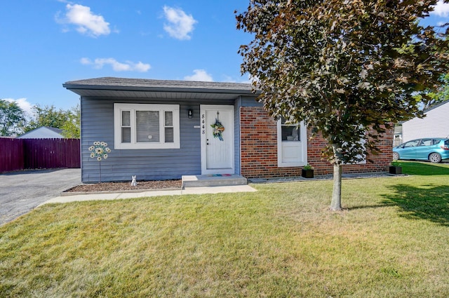 8448 Blue Lake Ave, Galloway, OH 43119 - bungalow-style house featuring brick siding