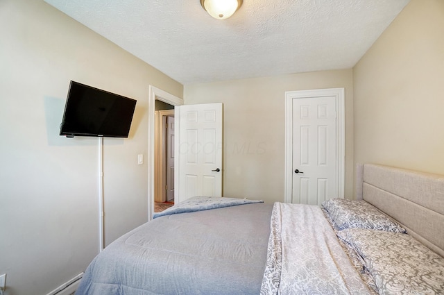 8448 Blue Lake Ave, Galloway, OH 43119 - bedroom featuring a textured ceiling