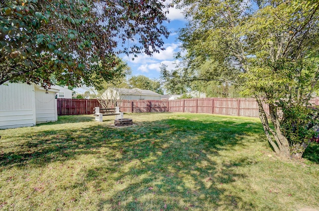 8448 Blue Lake Ave, Galloway, OH 43119 - view of yard with an outdoor fire pit