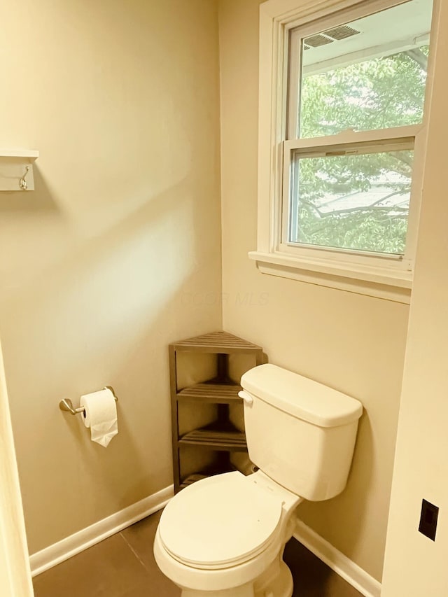 460 Blandings Ct, Worthington, OH 43085 - bathroom with toilet, baseboards, and tile patterned floors