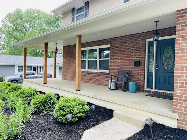 460 Blandings Ct, Worthington, OH 43085 - property entrance featuring covered porch and brick siding