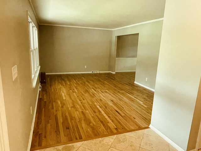 460 Blandings Ct, Worthington, OH 43085 - unfurnished room featuring crown molding, wood finished floors, and baseboards