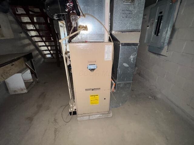 68511 Liston Ave, Bridgeport, OH 43912 - utility room with electric panel and heating unit