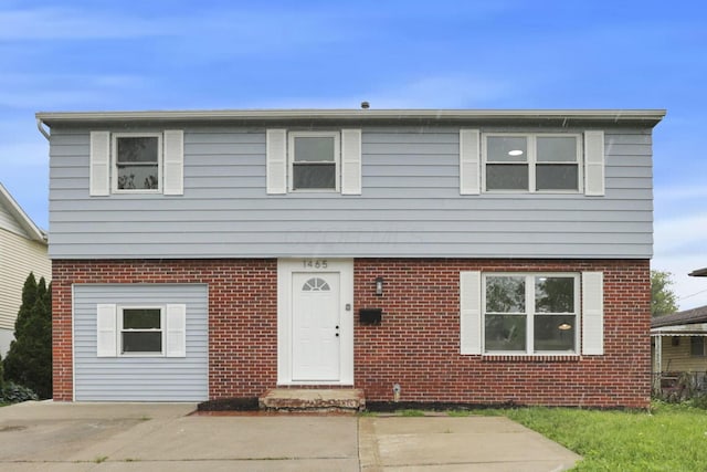 1465 Zenner Dr, Columbus, OH 43207 - colonial-style house featuring brick siding