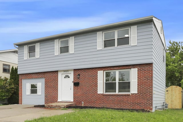 1465 Zenner Dr, Columbus, OH 43207 - colonial-style house featuring brick siding