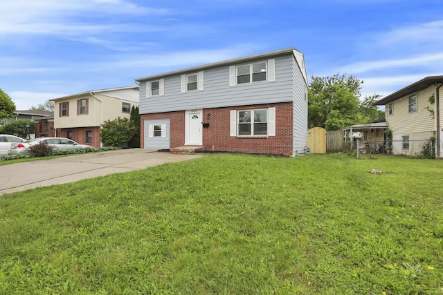 1465 Zenner Dr, Columbus, OH 43207 - colonial-style house with brick siding and concrete driveway