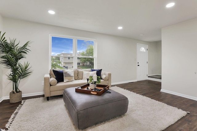 1465 Zenner Dr, Columbus, OH 43207 - living area with wood finished floors, baseboards, and recessed lighting
