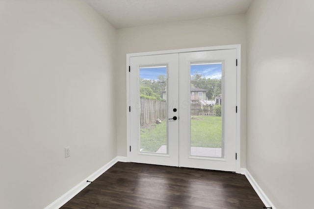 1465 Zenner Dr, Columbus, OH 43207 - entryway with french doors, dark wood-type flooring, and baseboards