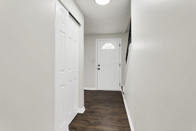 1465 Zenner Dr, Columbus, OH 43207 - entryway featuring baseboards and wood finished floors