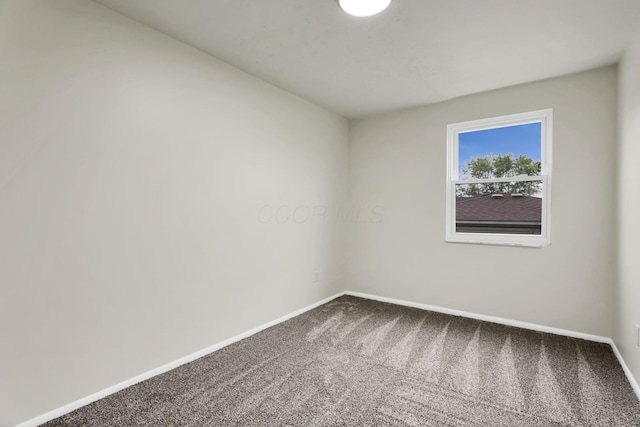 1465 Zenner Dr, Columbus, OH 43207 - unfurnished room with carpet floors and baseboards