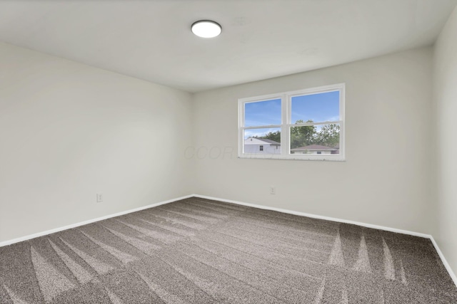 1465 Zenner Dr, Columbus, OH 43207 - empty room featuring baseboards and carpet flooring
