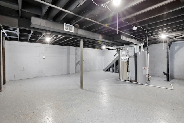 1465 Zenner Dr, Columbus, OH 43207 - unfinished below grade area featuring water heater and stairway