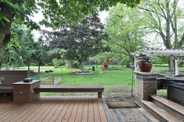 4359 Shire Cove Rd, Hilliard, OH 43026 - wooden deck with a yard and a playground