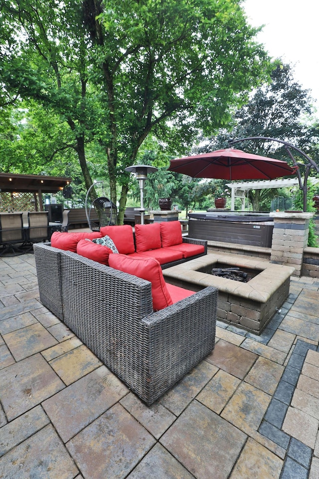 4359 Shire Cove Rd, Hilliard, OH 43026 - view of patio / terrace with an outdoor living space with a fire pit and a jacuzzi