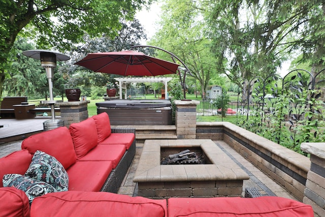 4359 Shire Cove Rd, Hilliard, OH 43026 - view of patio / terrace with a hot tub and an outdoor living space with a fire pit