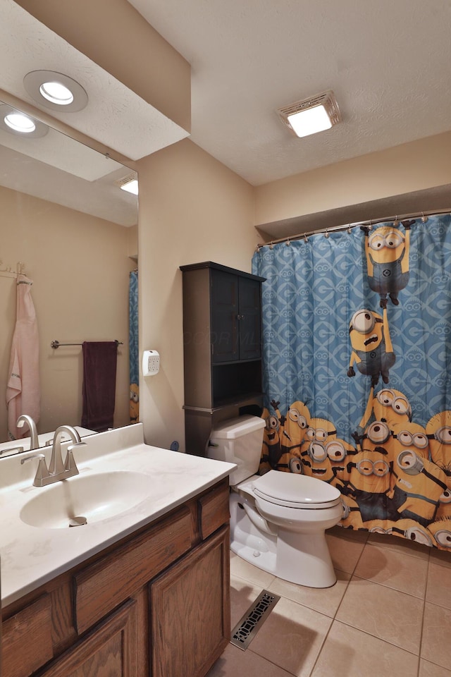 4359 Shire Cove Rd, Hilliard, OH 43026 - full bathroom featuring toilet, tile patterned flooring, vanity, and recessed lighting